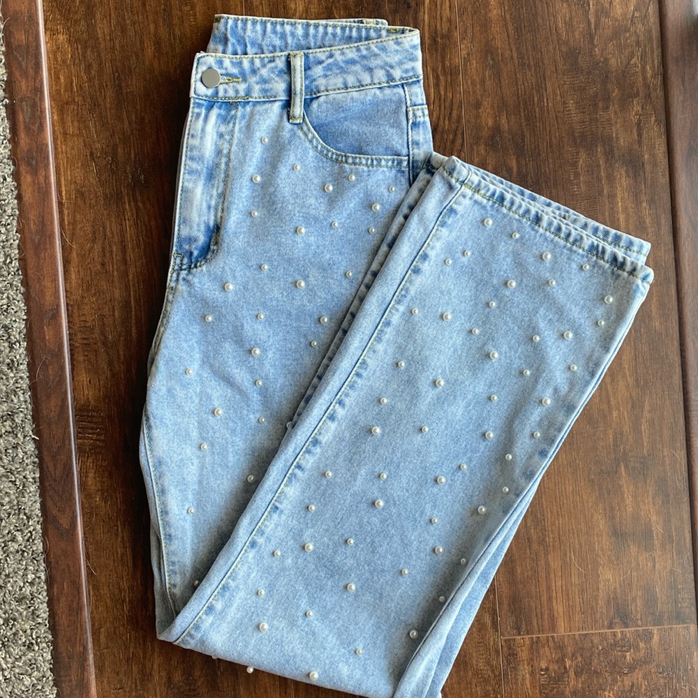 Light wash pearl studded jeans